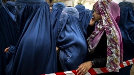 Afghanistan runs out of ballot papers as election turnout surprises