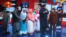 Mashal and Ibrahim presenting a tabloid in Khyber Show of AVT Khyber_award