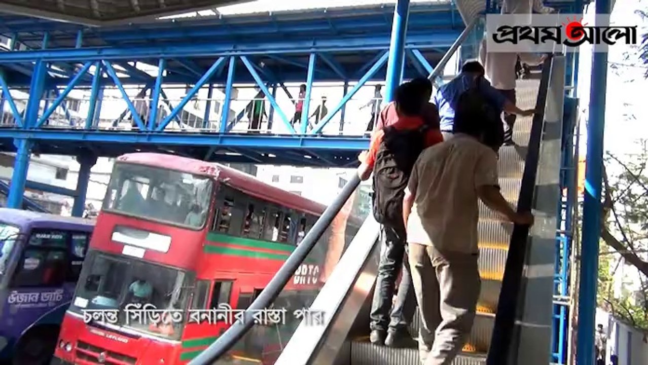 People using electric escalator at Banani in Dhaka