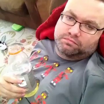 Exhausted Dad Drinks Coffee On Saturday Morning While Daughter Dances To Pop Music