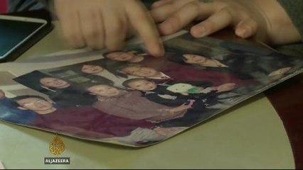 Families of #MH370 passengers mark one month