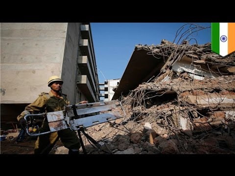 Building under construction collapses, killing at least 14