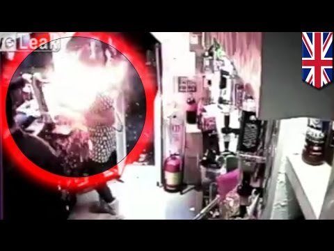 E-cigarette on charge explodes in bartender's face: CAUGHT ON CCTV CAMERA