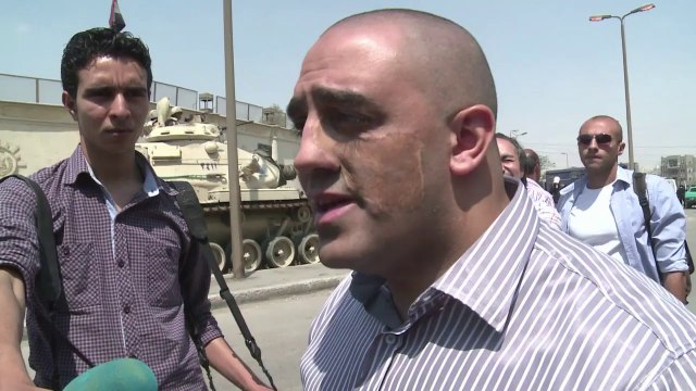 Detained Al-Jazeera journalists back in Cairo court