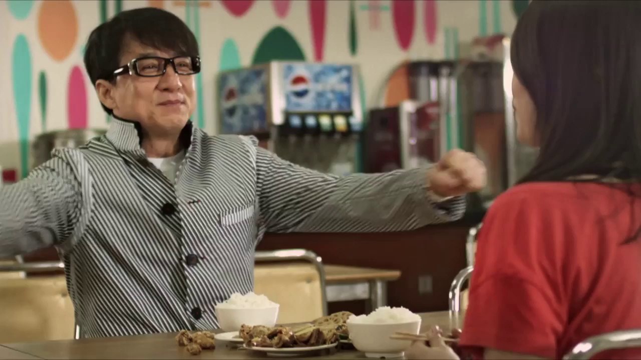 Portrait de Jackie Chan avec des batons d'eskimo!