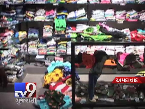 Police seize counterfeit branded clothes, Ahmedabad - Tv9 Gujarati