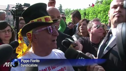 Italie: Berlusconi commence ses travaux d'intérêt général