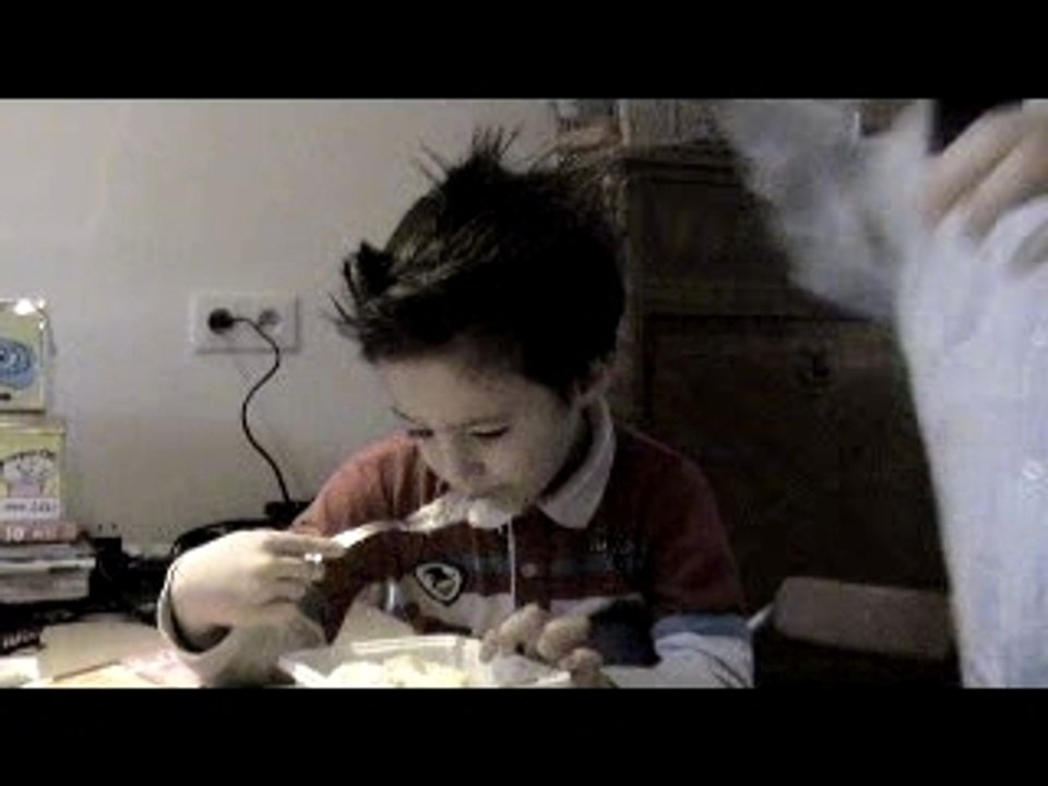 French boy eating durian
