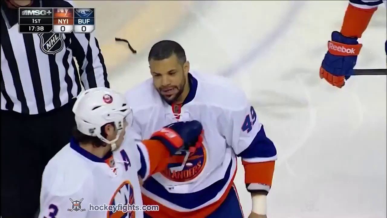 'David and Goliath' hockey fight ends badly for Goliath - Big tree fall hard.