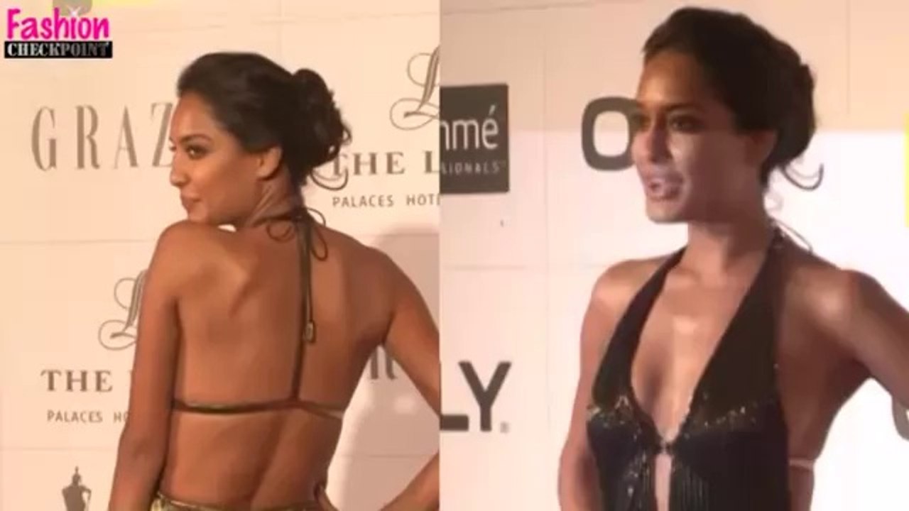 Lisa Hayden SIZZLES in a BACKLESS & DEEP NECK gold gown