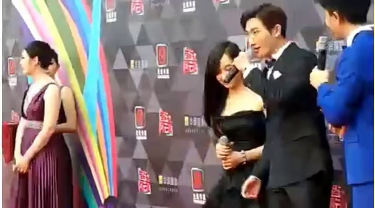 2014.04.13 Top Chinese Music Awards Show: Zhou Mi & Victoria in Red Carpet