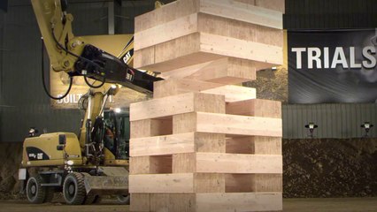 Playing Giant Game Of Jenga With Heavy Machinery