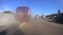Crazy biker driving so so fast in highway traffic!