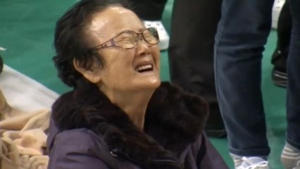 Distraught families of missing South Korean ferry passengers await news
