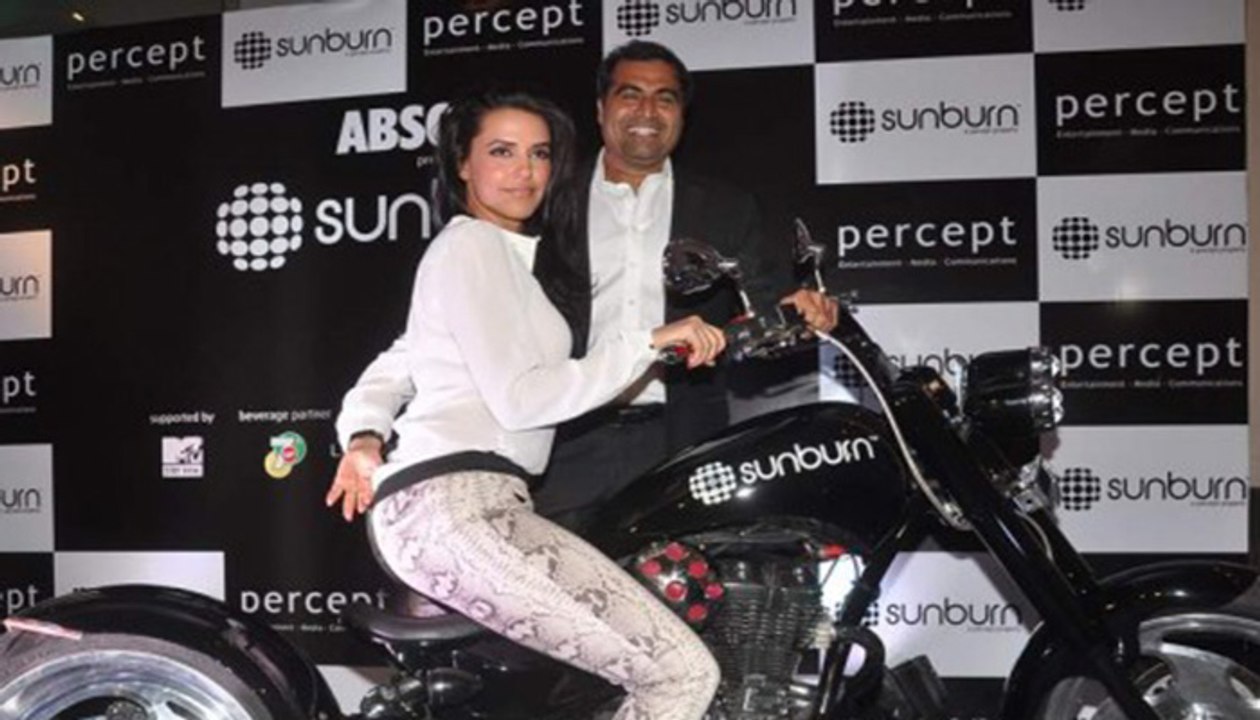Bollywood Girl Neha Dhupia looks Hot in Zara Python Jeans during launches The First look of Sunburn chopper