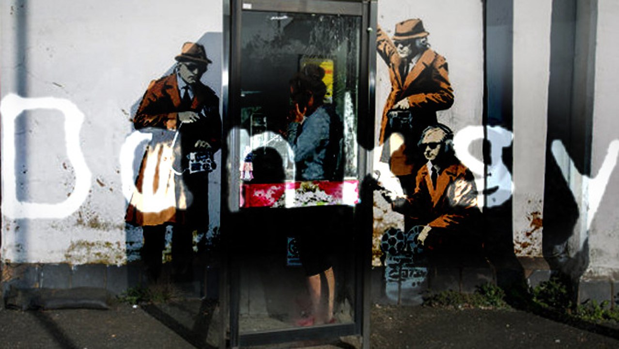 Banksy UK Takes On Tech: Surveillance And Cell Phones