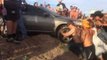 Festival Goers Come Together to Save a Trapped Driver