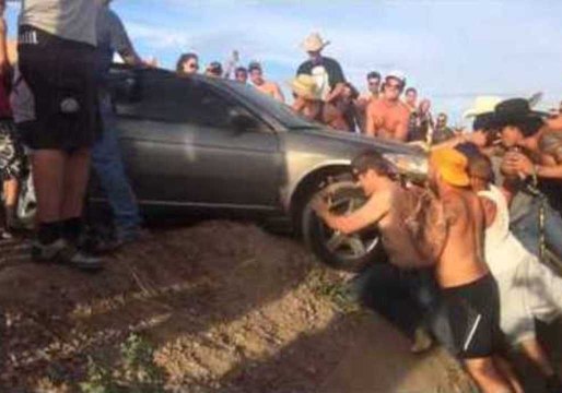 Festival Goers Come Together to Save a Trapped Driver
