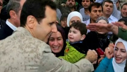 Syria's Assad pays Easter visit to recaptured Christian town