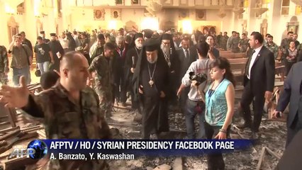 Assad visita cidade cristã na Páscoa