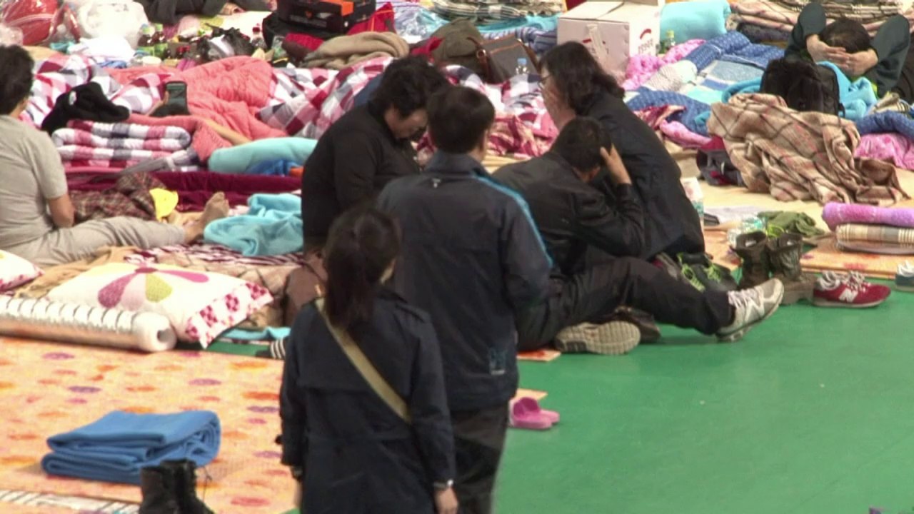 Ferry divers face daunting task as families despair