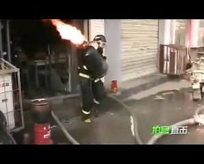 Chinese Fireman Hailed As Hero