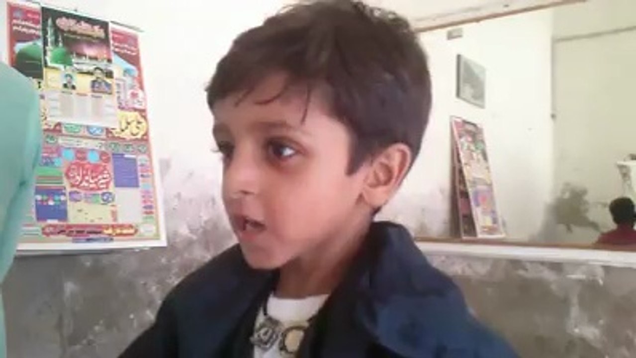 muhammad abdullah irfan mughal, waiting for hair cut, mananwala, mar 2014