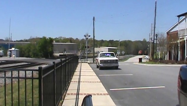 BNSF power leads NS 737 coal train SB through Austell Ga.