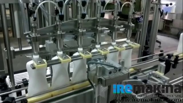 ire makina - Tam Otomatik Likit Dolum ve Kapama Makinası