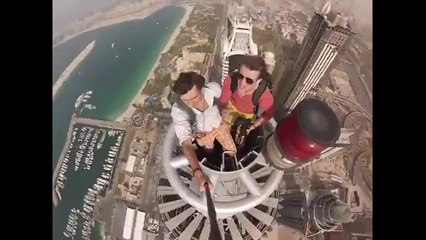 ‫"Crazy Russians" Climbed to top of Dubai highest towers‬