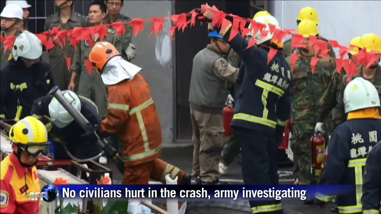Taiwan pilots hurt as Apache chopper crash-lands on building