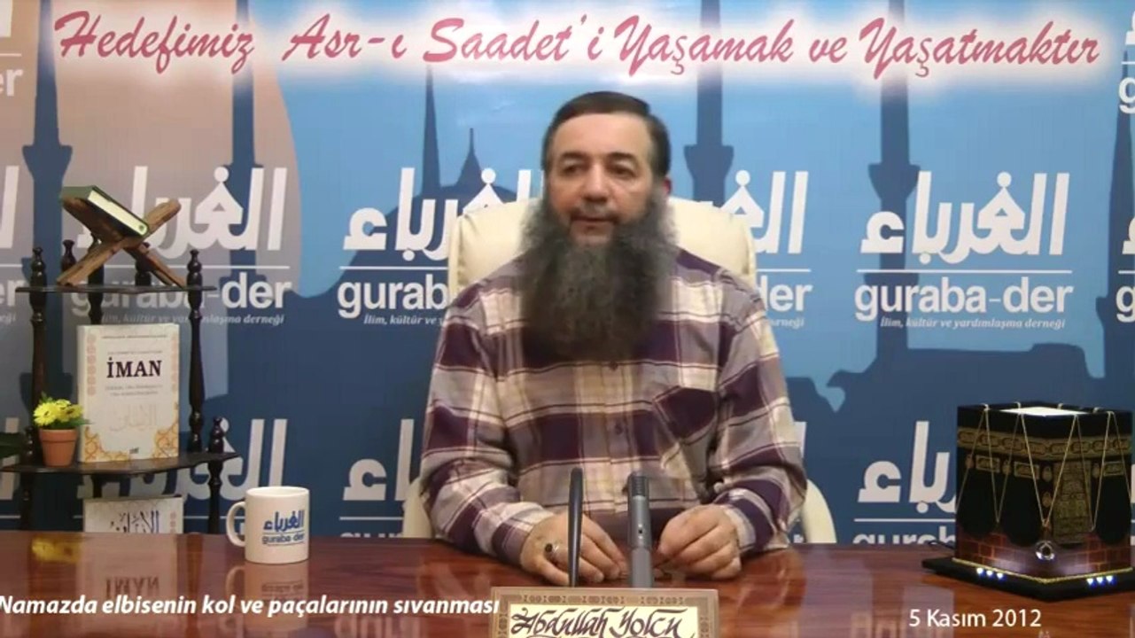namazda elbiseyi kıvırmak.ayakkabı ile namaz