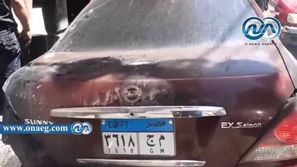 مجهولون يشعلون النيران بسيارتين داخل معرض بالمحلة