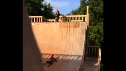 Crash Kid ! Crazy Father pushing his son over a skateboard ramp !