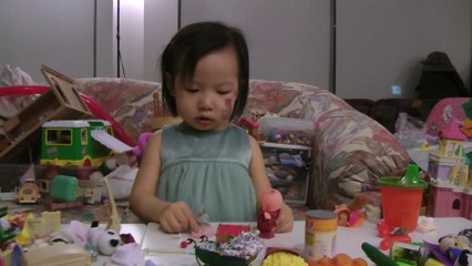 Girl And Sylvanian Families