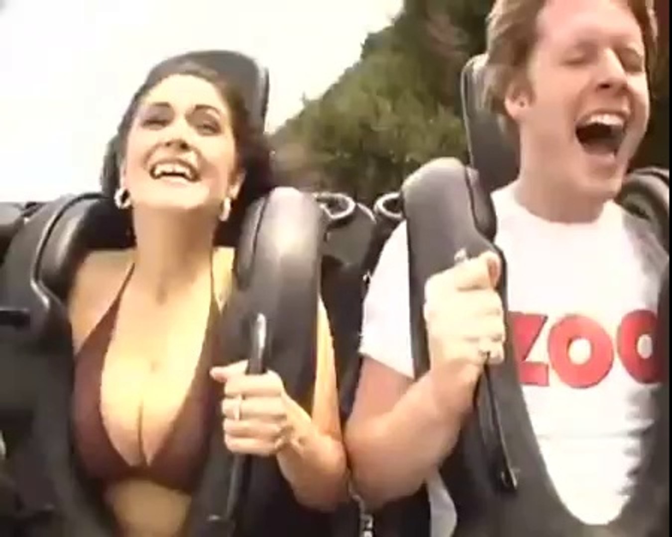 Boobs fall out on roller coaster