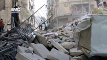 Aleppo shrouded in smoke in aftermath of explosive barrels