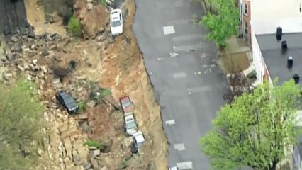 Heavy rains lash the US East Coast, cause street collapse