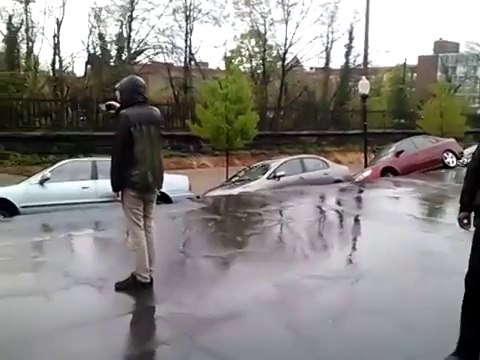 Bunch of cars are swallowed in seconds in Baltimore, USA... Unbelievable!!