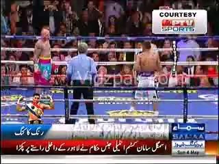 Luiz Collazo eating punches of Amir Khan