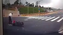 Amazing Scooter crash  : driver falling in manhole!