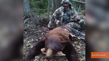 Karl Malone Kills Bear with Bow and Arrow