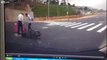 Motorcyclist crashes off bike and then disappears down a hole in the road - YouTube