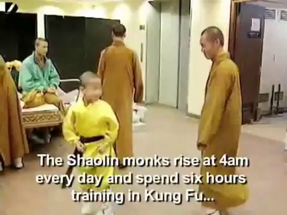 Shaolin Monk Balances On 2 Fingers