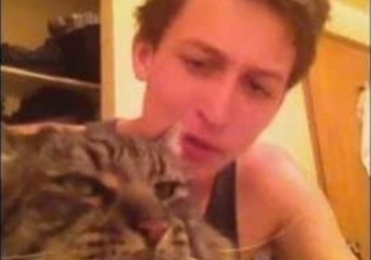 Boy and Cat Show the World the Meaning of Friendship