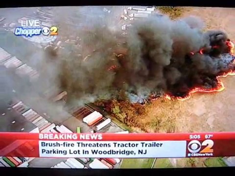 Brush Fire Threatens Truck Lot In Woodbridge Township, N.J.