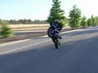 moto stunt haut la main