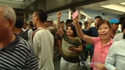 Thai forces descend on central Bangkok to stifle coup protests