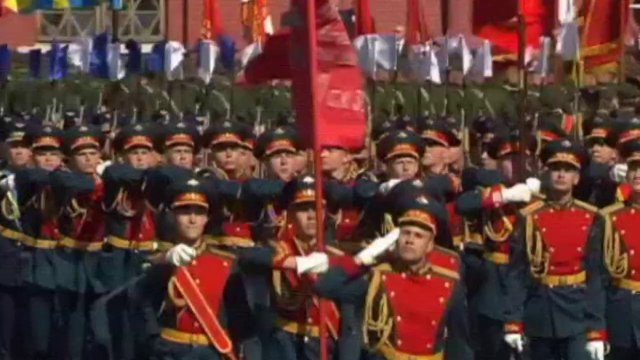 Heavy gunfire in eastern Ukraine as Putin visits Crimea