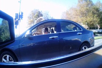 Driver on mobile phone. Christchurch NZ. 11 May 2014